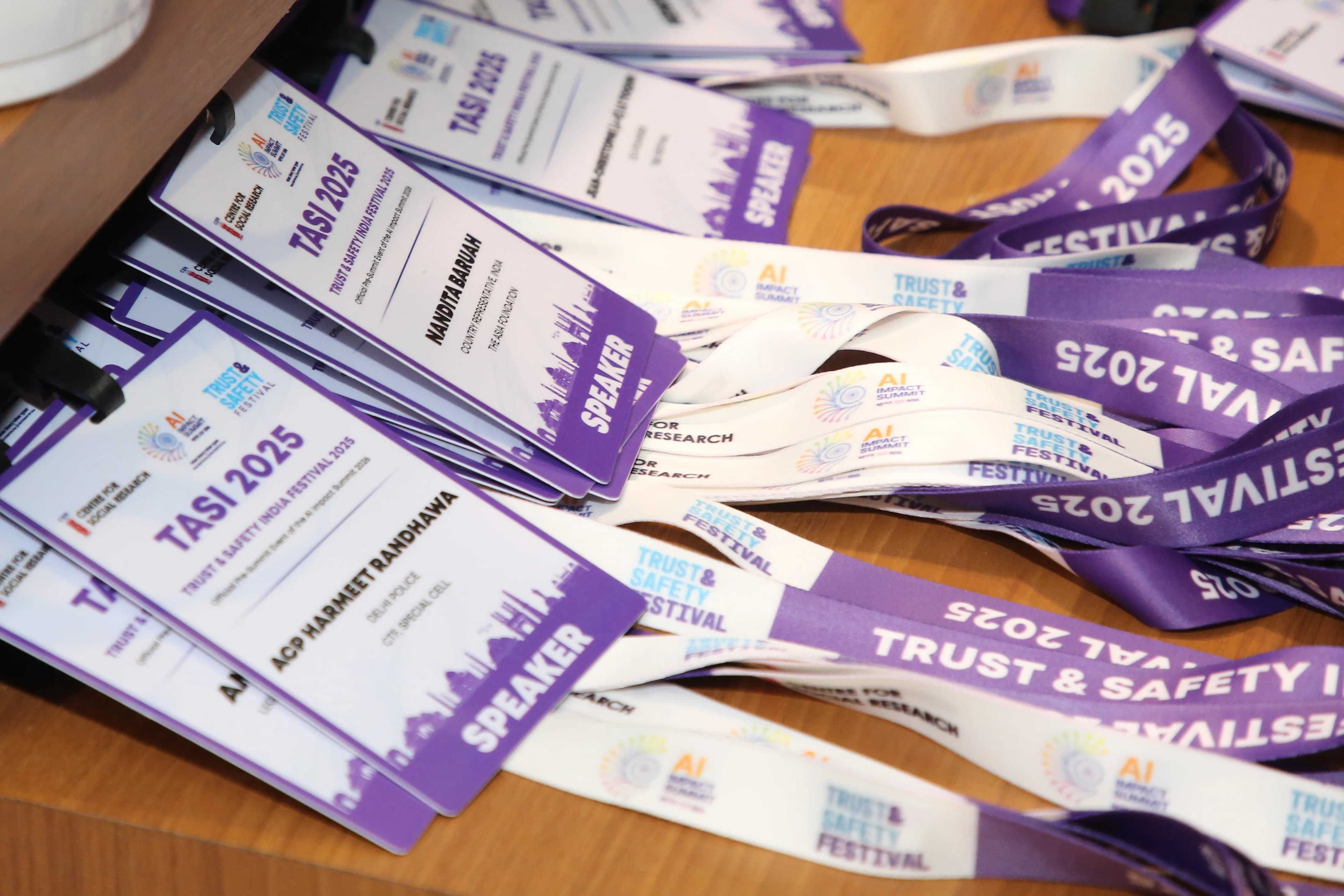 TASI 2025 speaker badges and lanyards